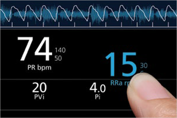 Close-up of a finger interacting with the Rad-97 touchscreen to adjust respiratory rate settings.